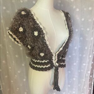 Adorable Never worn shrug.  Neiman Marcus